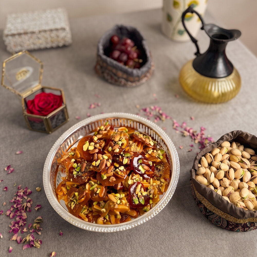 Glossy honey mixed-nut brittle with almonds, peanuts and pistachio on cream linen — Honey & Fig Bakery, Pflugerville, Texas